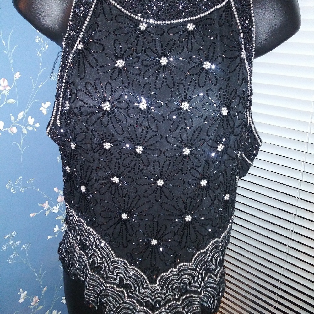 Beautiful beaded evening blouse.